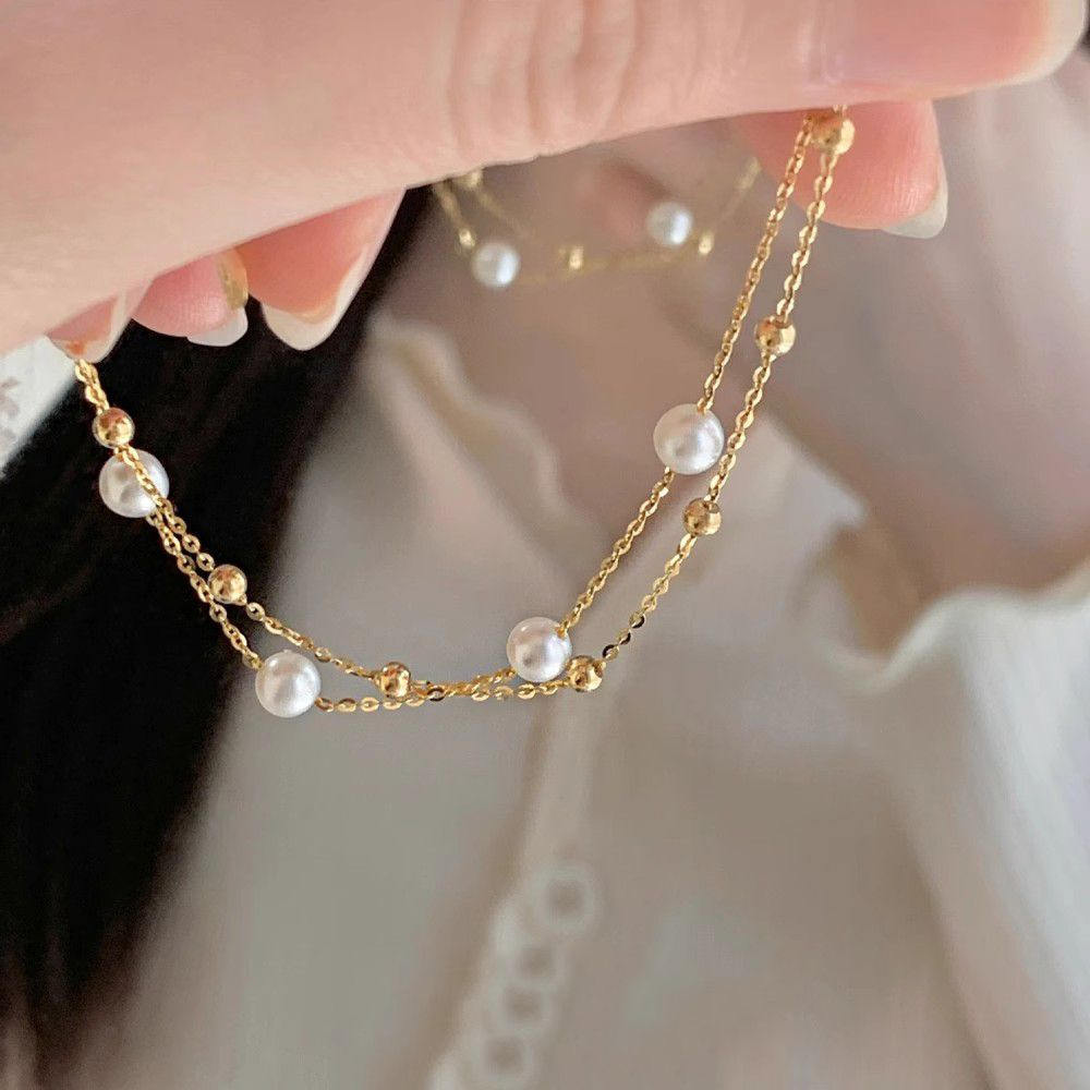 Dubbele Laag Parel Armband – Elegant & Tijdloos