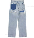 Jeans met Scheuren en Decoratieve Details
